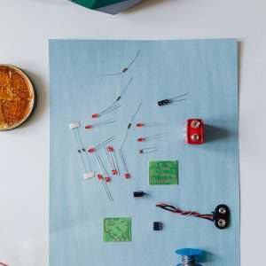 A top view of electronic components arranged for a soldering project, ideal for DIY tech enthusiasts.